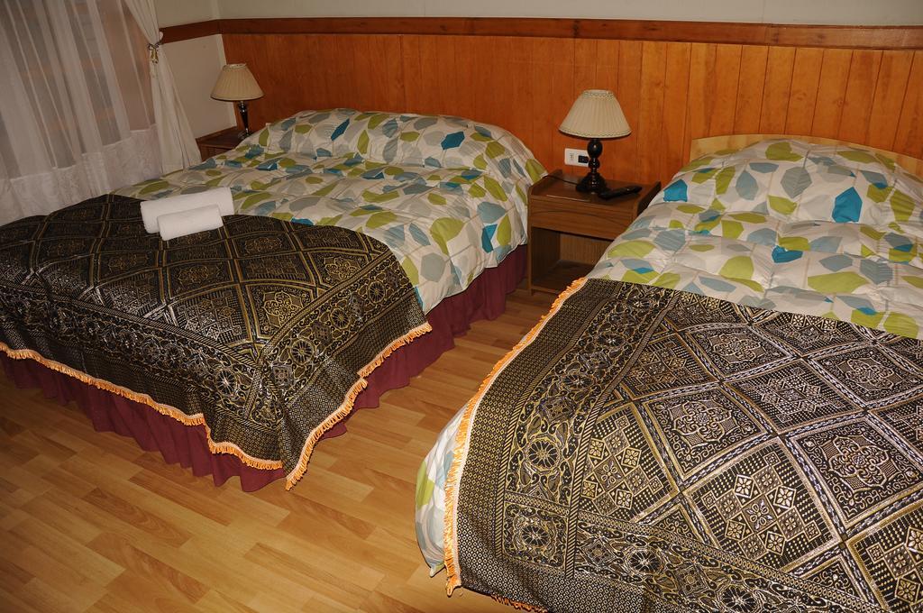 Hostal El Rincon Πουέρτο Νατάλες Δωμάτιο φωτογραφία